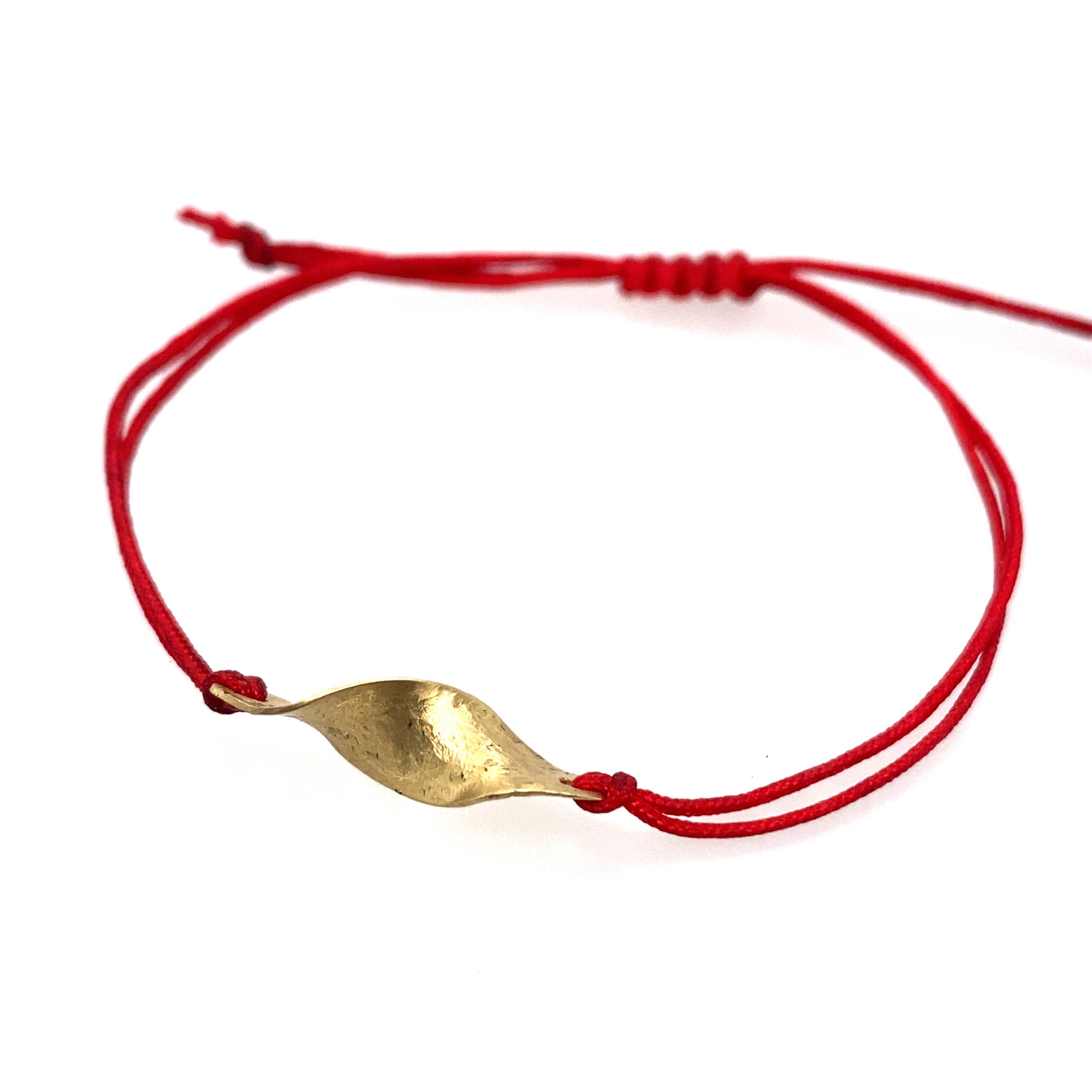 Armband mit 18 kt 750/- Gelbgoldelement Möbius/Nancy Fis Jewellery