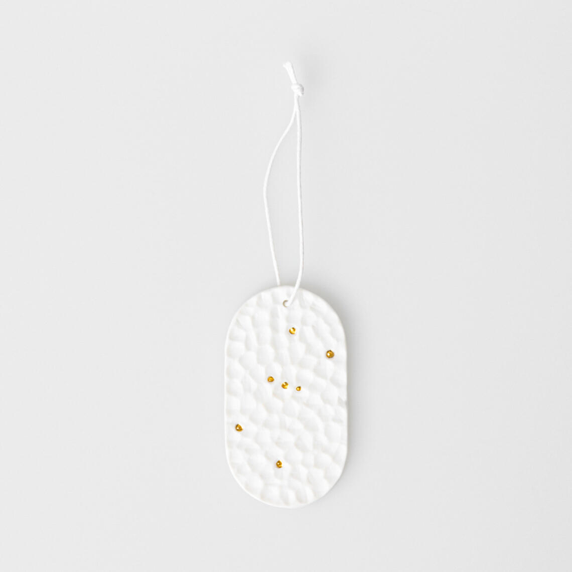 Pendentif constellation (7 × 4 cm)