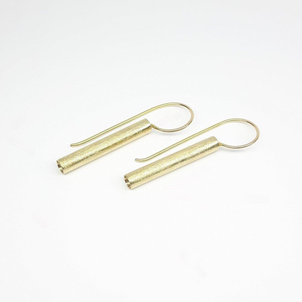 Earrings in 18kt yellow gold.