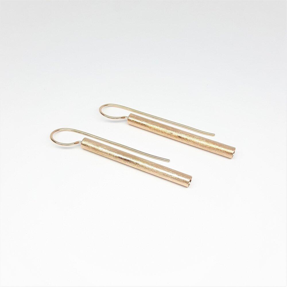 Earrings in 18kt rose gold.