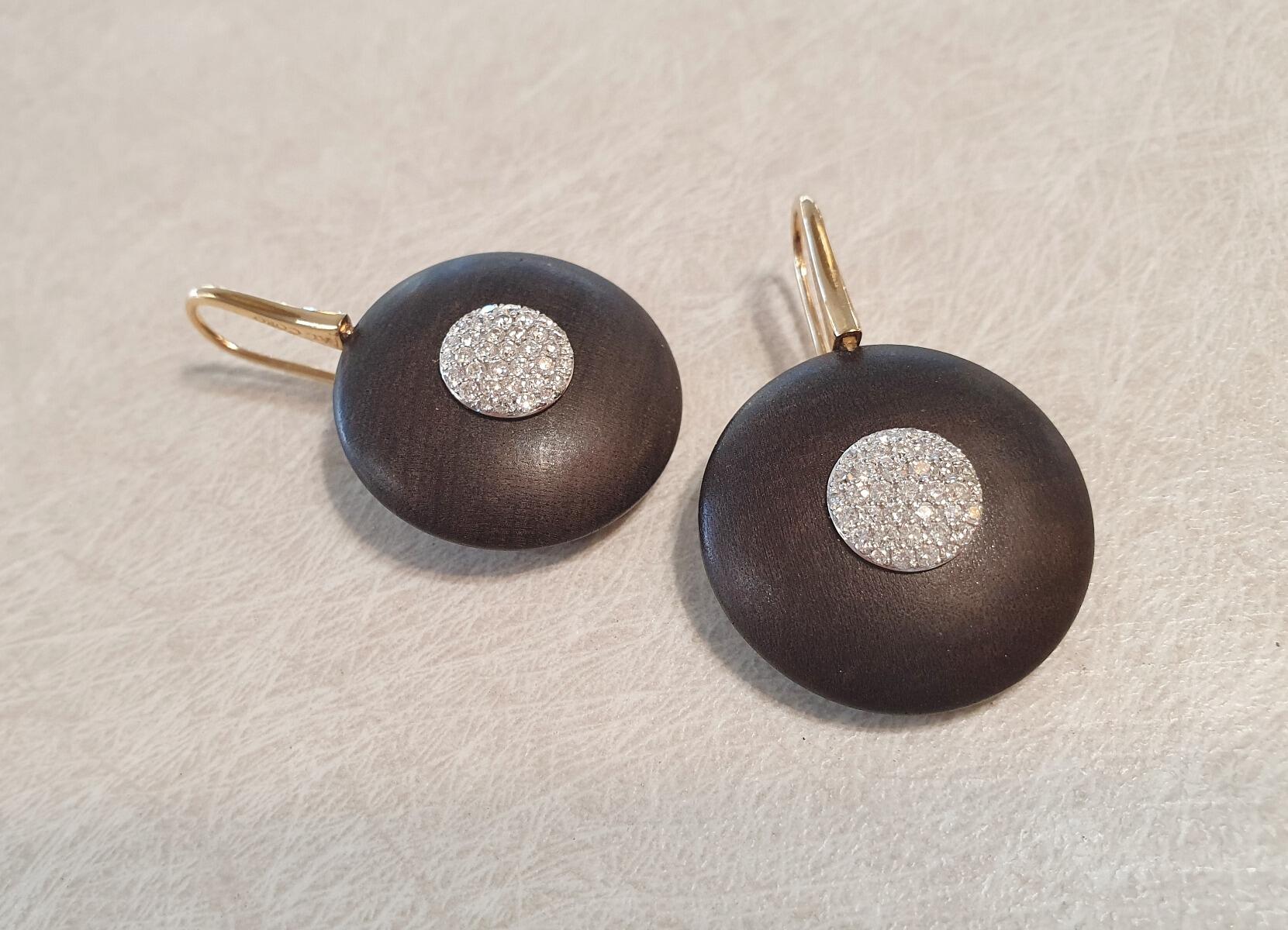 # Rose gold and ebony hook earrings set with 0.32ct natural diamonds on a white gold pastille