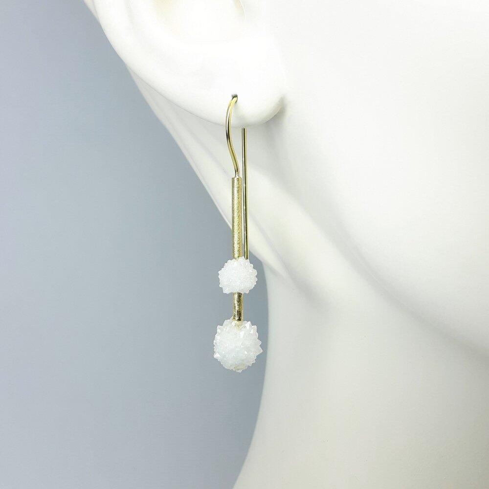 "snowball", earrings made of crystallized rock crystal and 18kt yellow gold.