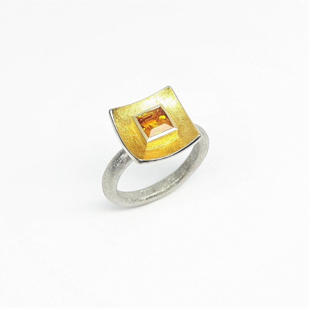 Ring made of 925 silver, fine gold and yellow sapphire. Unique piece.