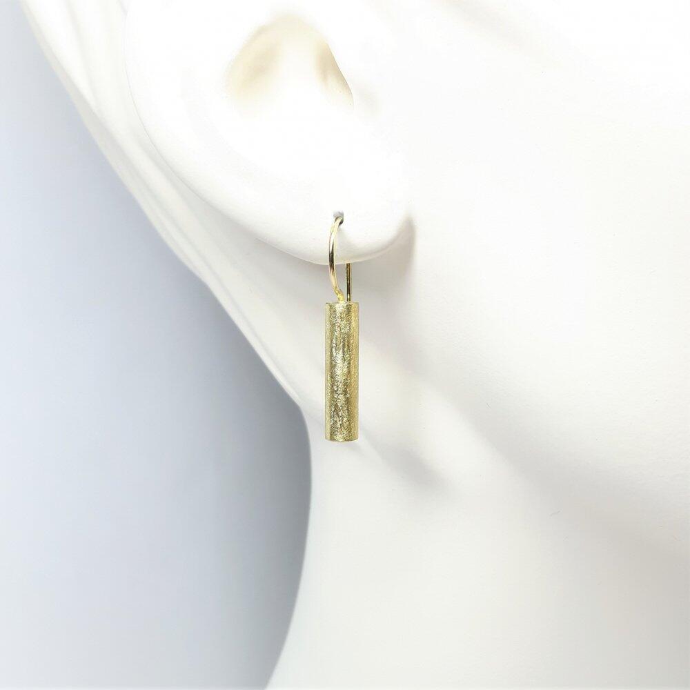 Earrings in 18kt yellow gold.