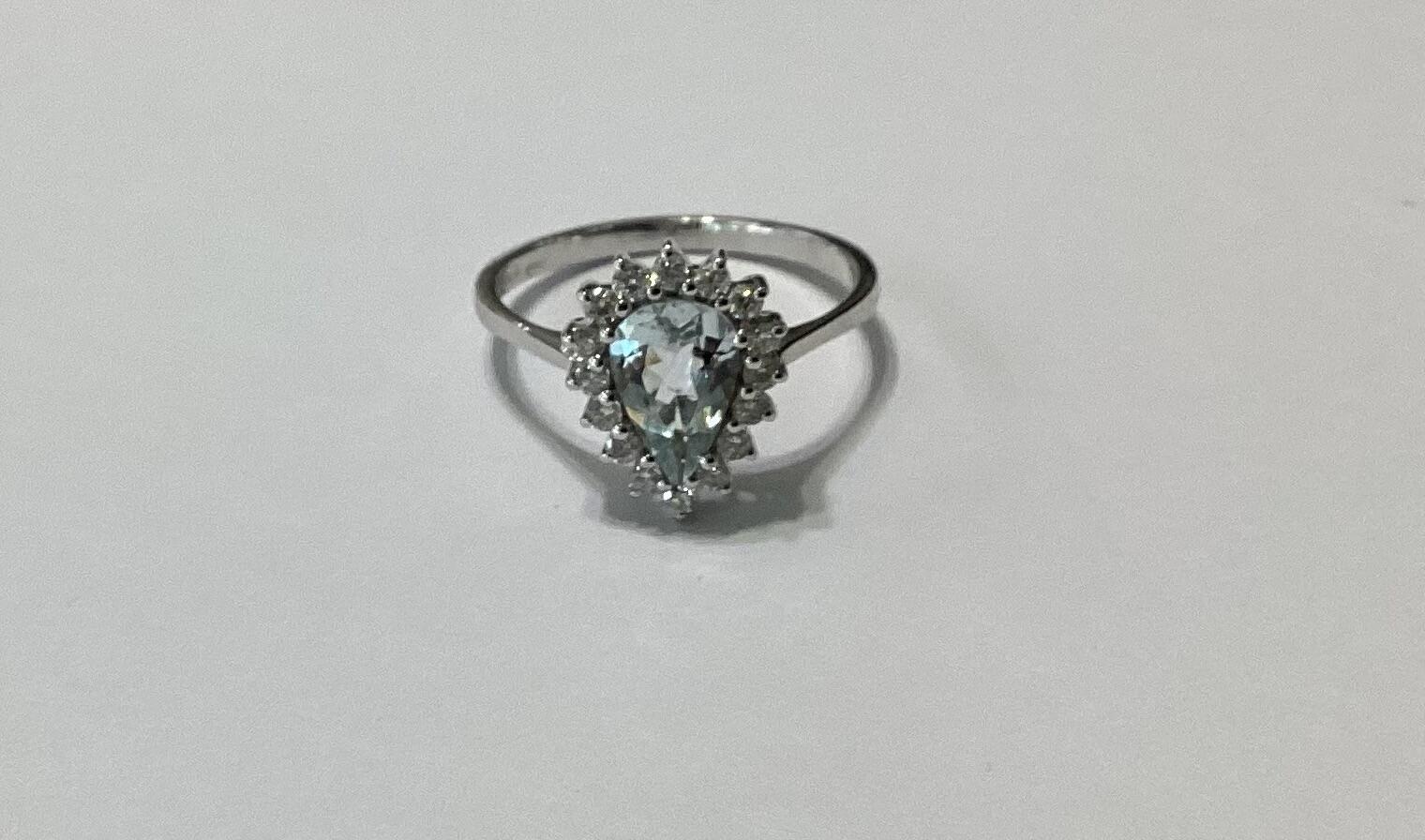 # 18K White Gold Ring with an Aquamarine and 0.32ct of Natural Diamonds