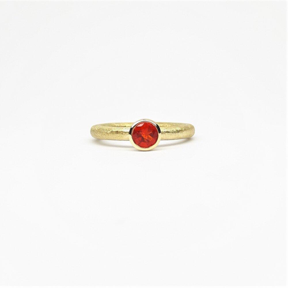 "combiring small", 18kt yellow gold and fire opal Ø5mm.