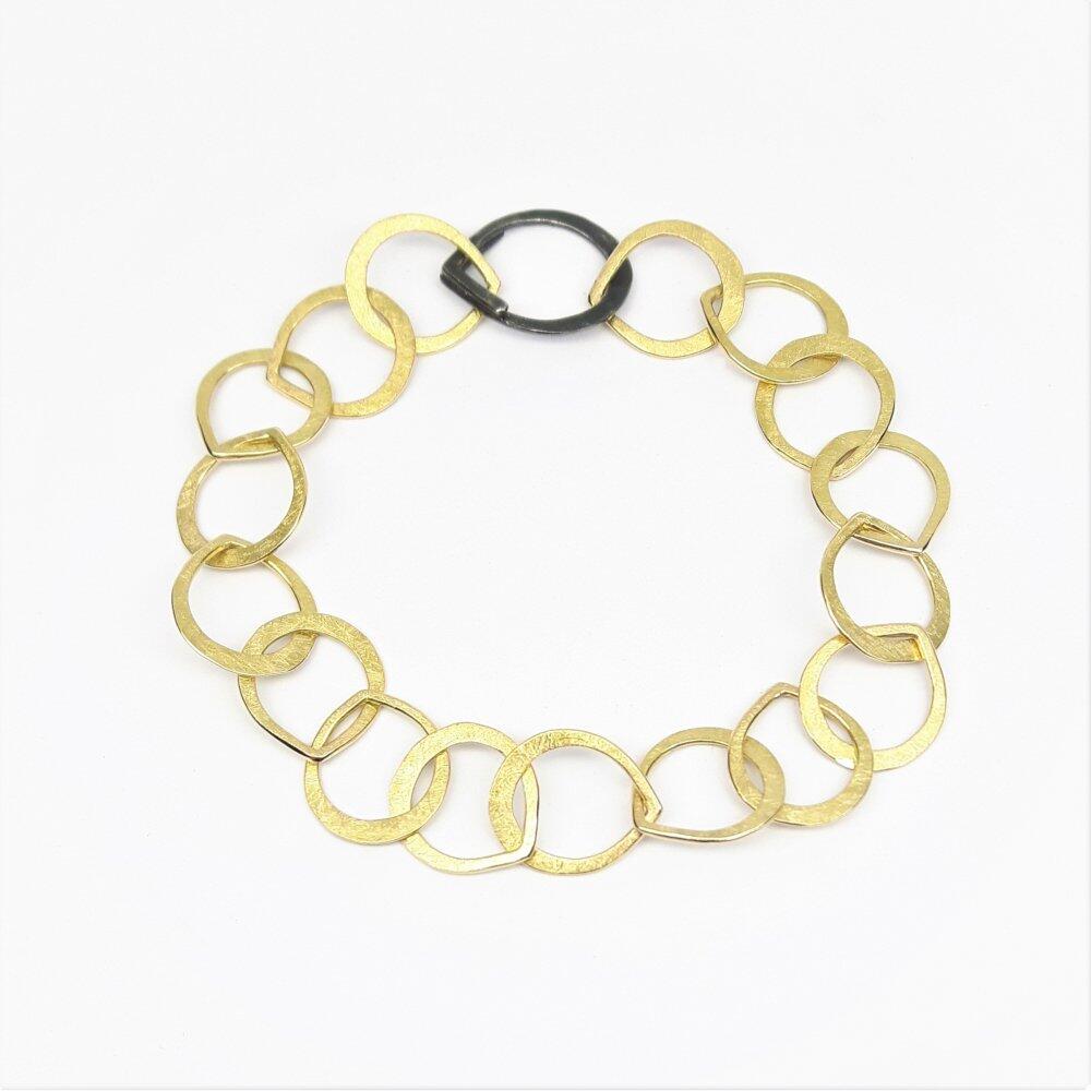 "drops", bracelet en or jaune 18kt et argent 925/- noirci.