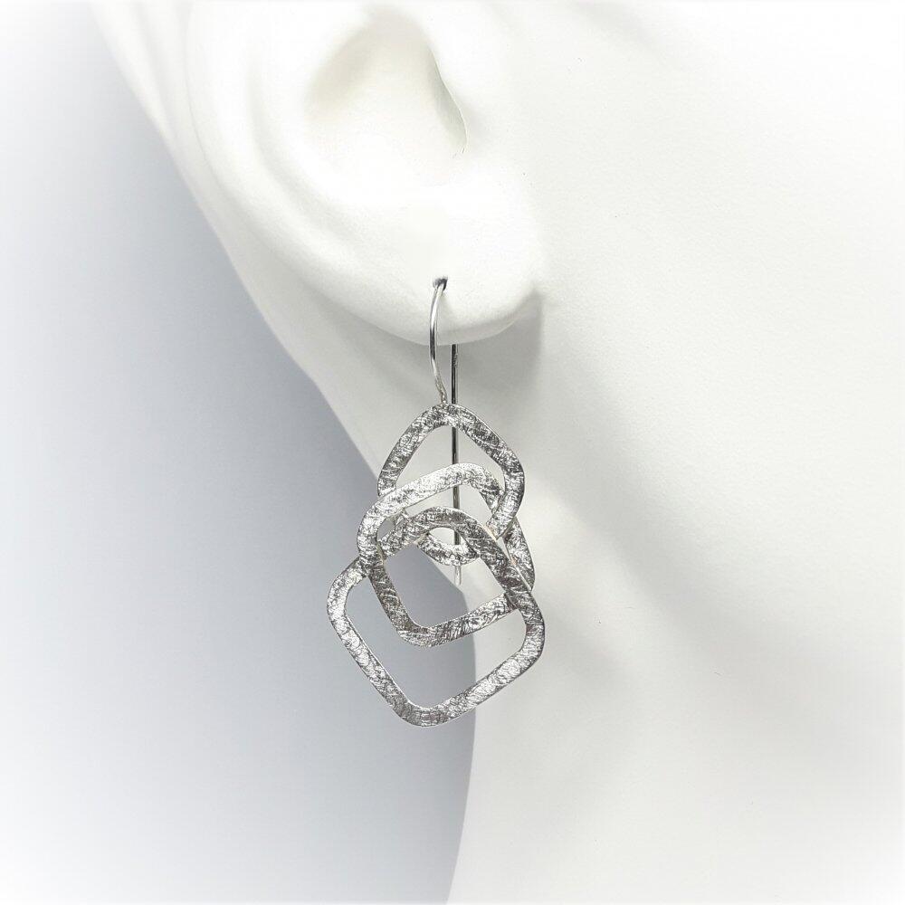 Boucles d'oreilles "dancing squares" en argent 925/- . Pièce unique.