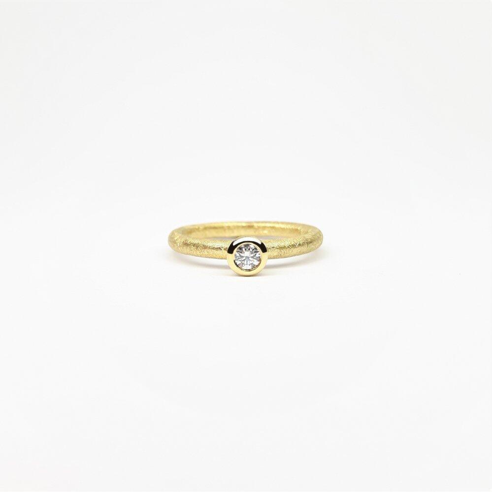 "combiring mini", 18kt Gelbgold mit 0,1ct Brillant.