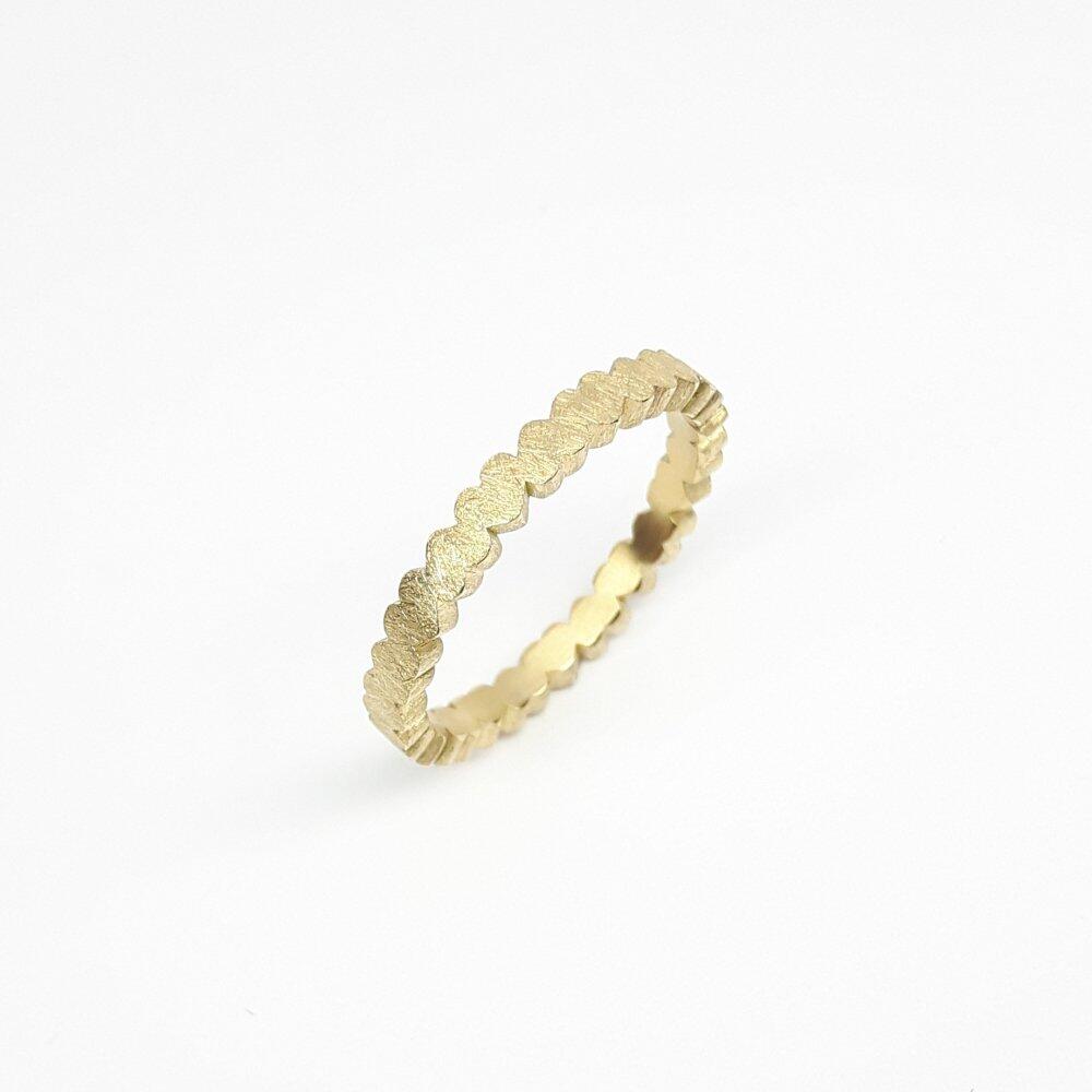 "heartbeats", ring made of 22 hearts, 18kt yellow gold.