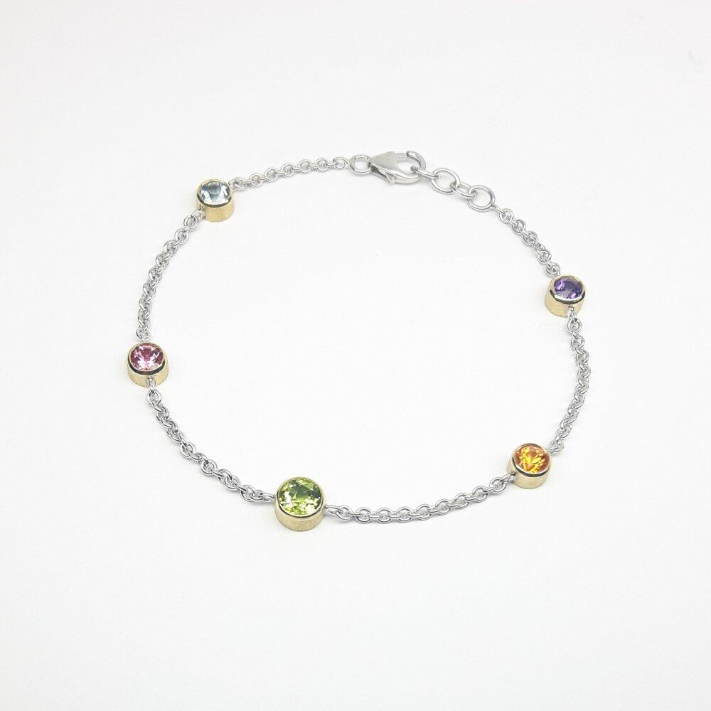 Armkettchen aus 18kt Weiß- und Gelbgold, mit Amethyst, Mandaringranat, rosa Turmalin, Aquamarin und Peridot. Unikat.