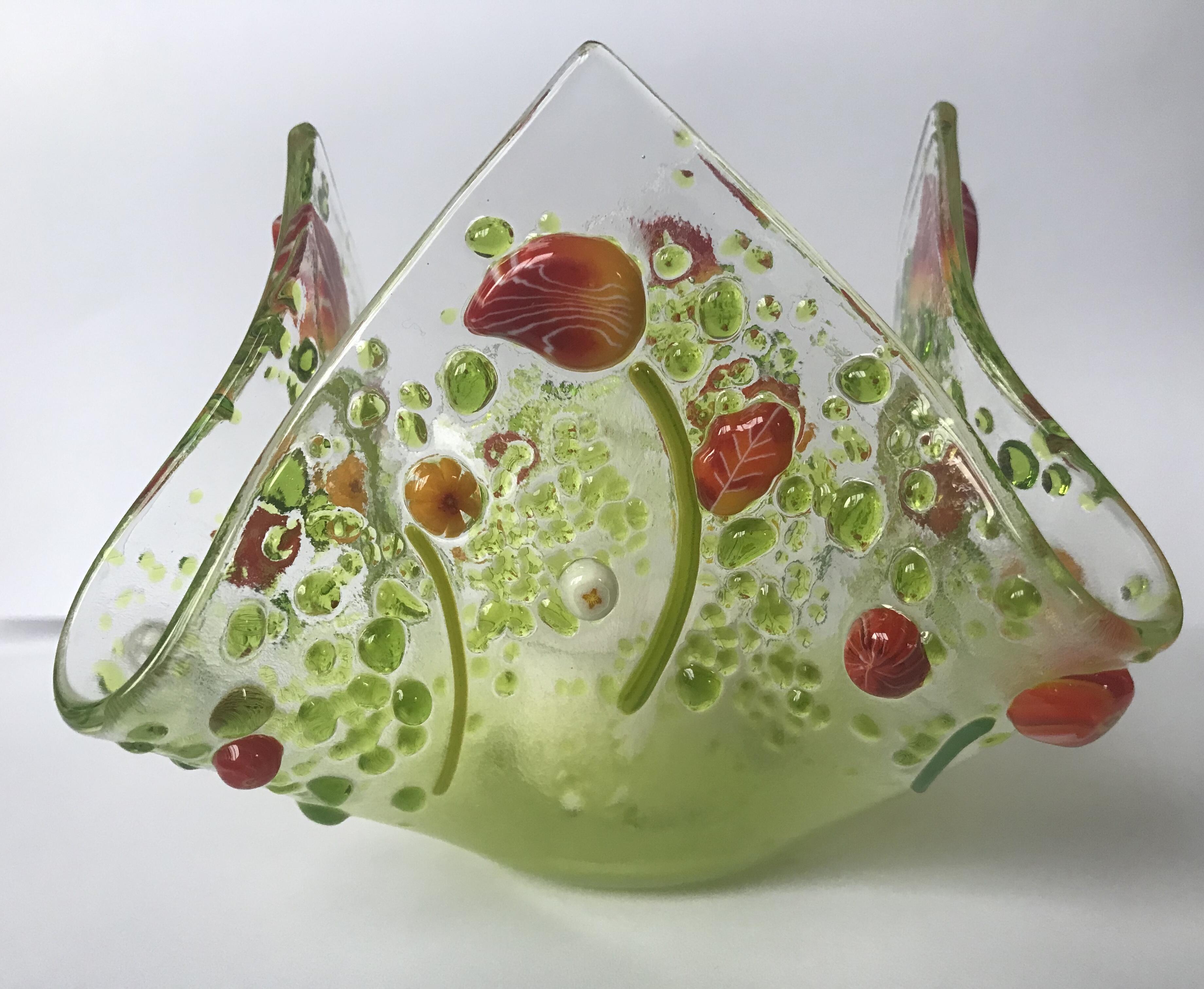 Bougie à chauffe-plat en verre transparent, avec millefiori floral et rehauts de couleur, pièce unique