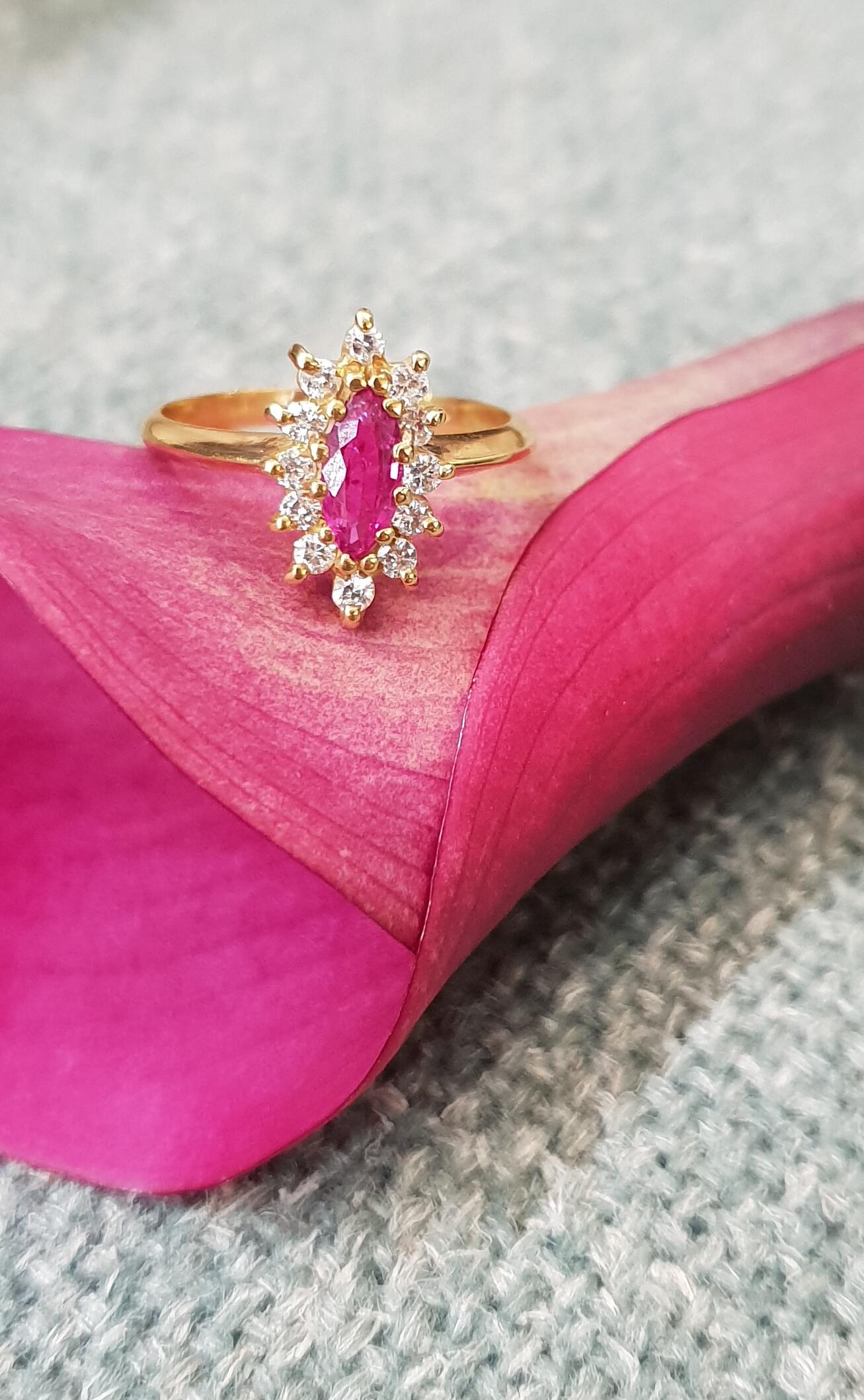 # 18K Gelbgoldring mit 0,42 ct Rubin und 0,36 ct natürlichen Diamanten