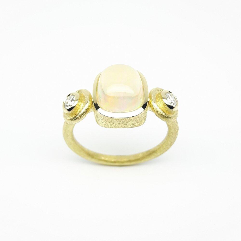 18k yellow gold ring with fire opal and diamonds. One of a kind.