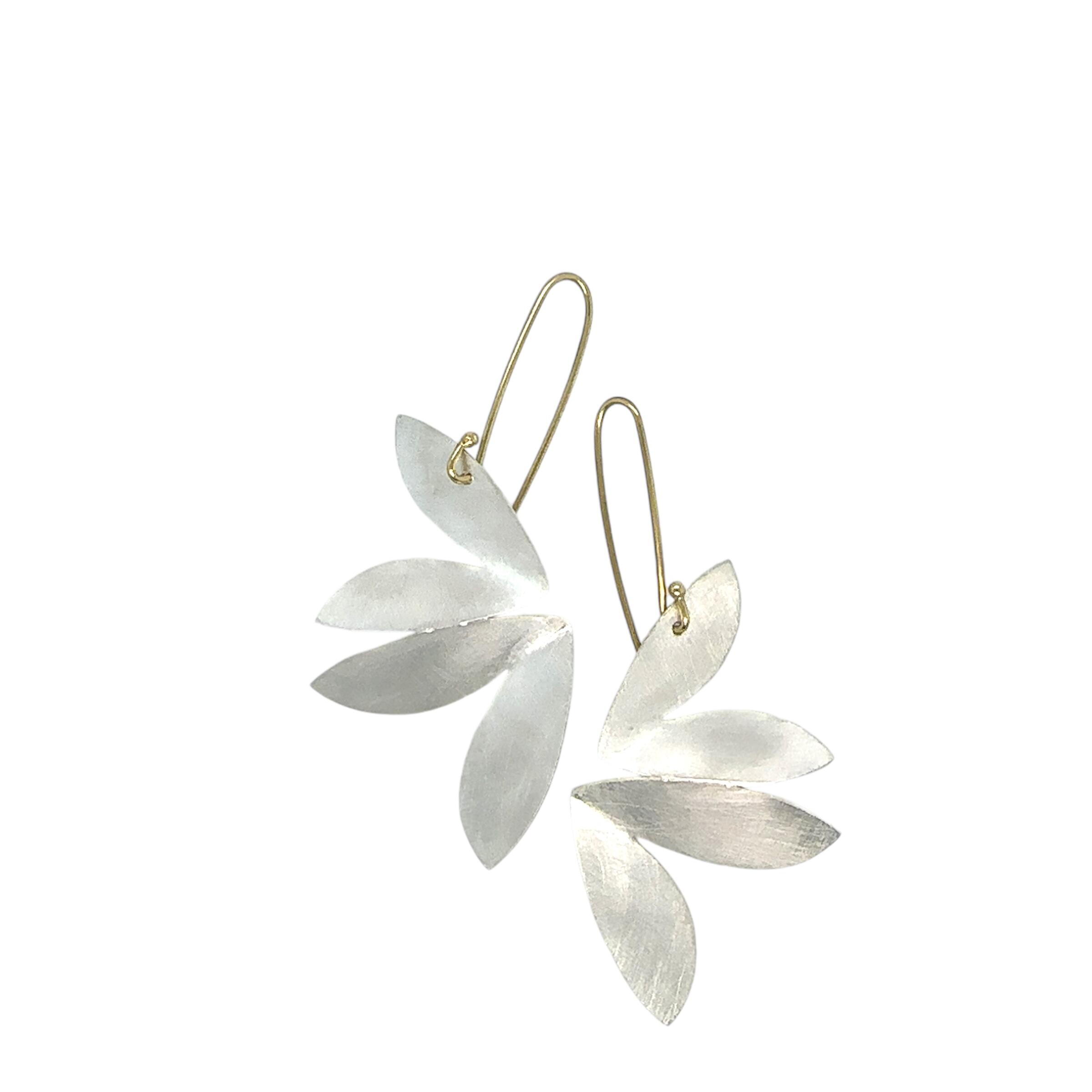 Earrings in yellow gold and silver