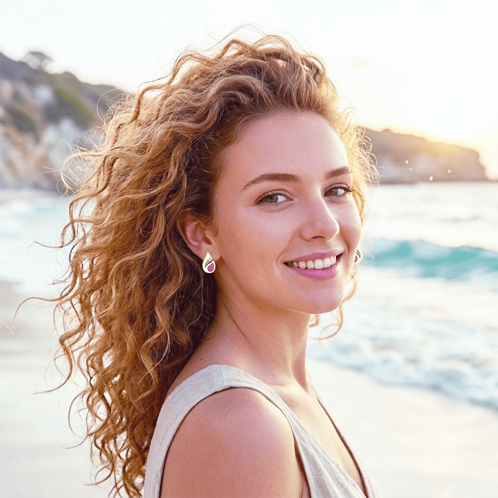 Clous d'oreilles en or bicolore 333 avec un rubis.