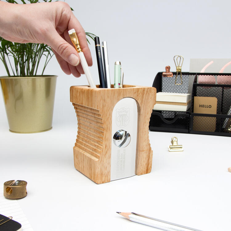 Pencil holder in the form of pencil sharpener
