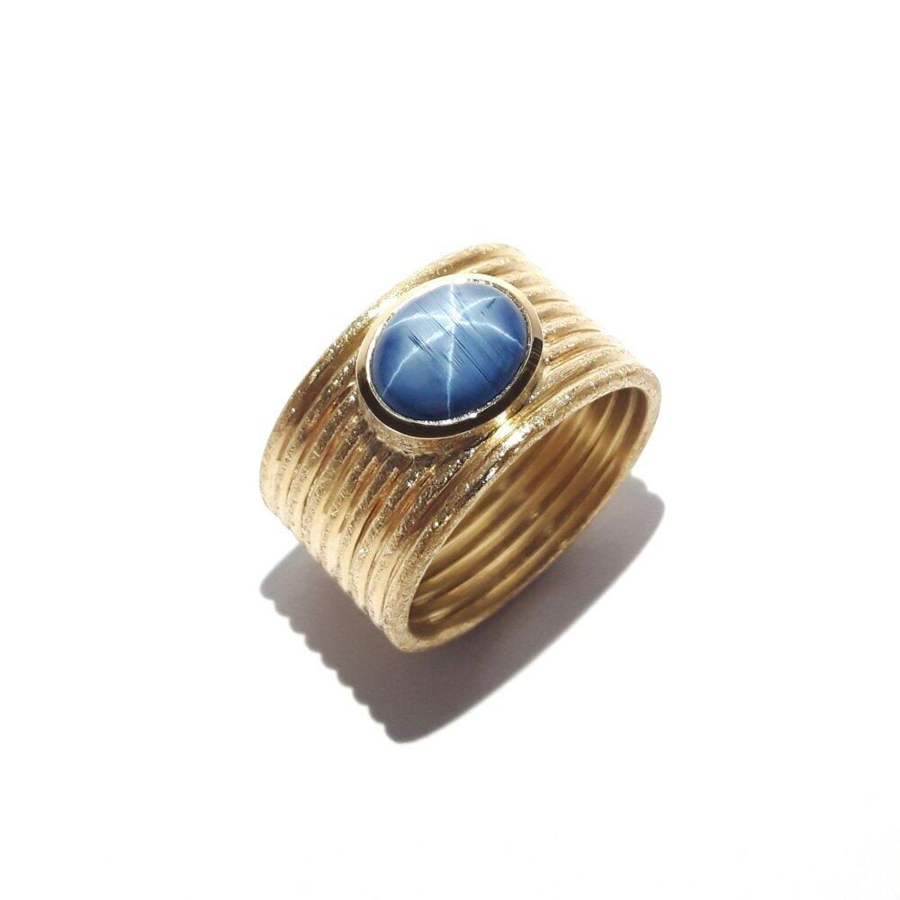 "star sapphire", ring made of 18k yellow gold and a rare star sapphire. One of a kind.