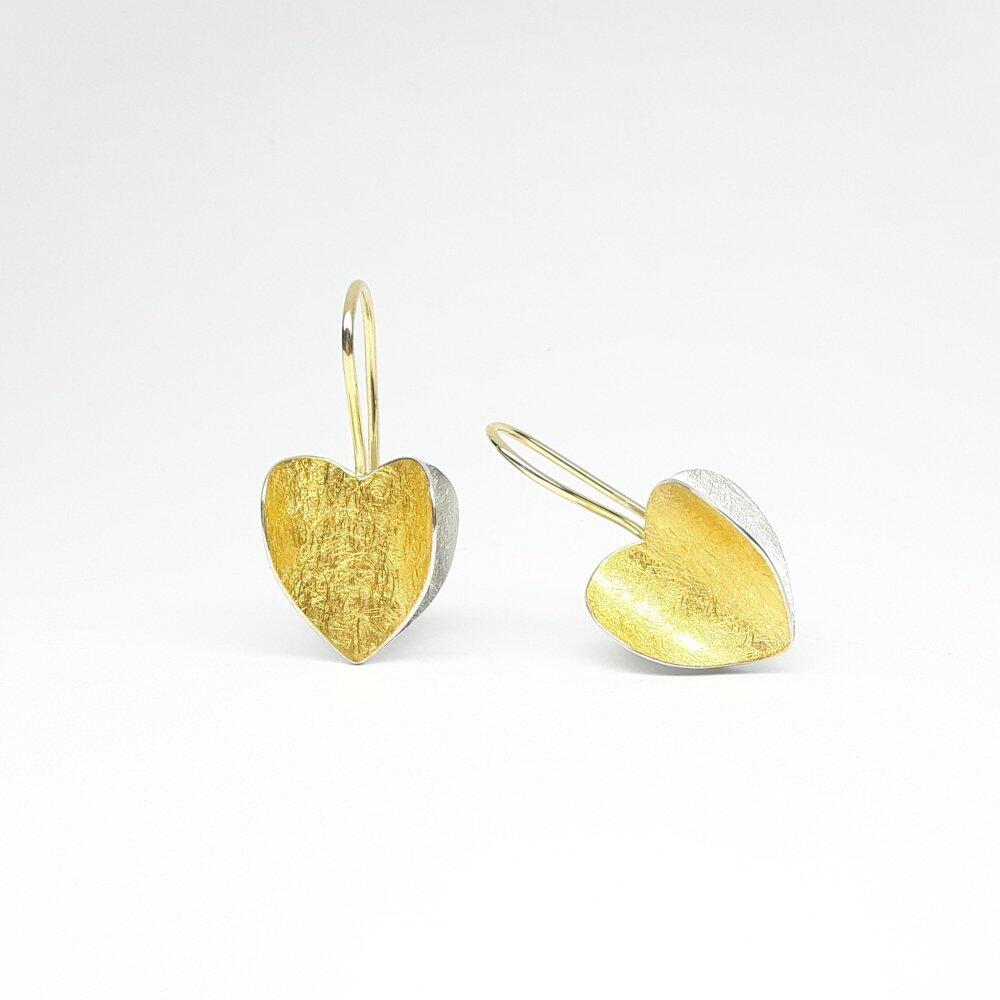 Heart earrings in fine gold, 18kt yellow gold and 925 silver.