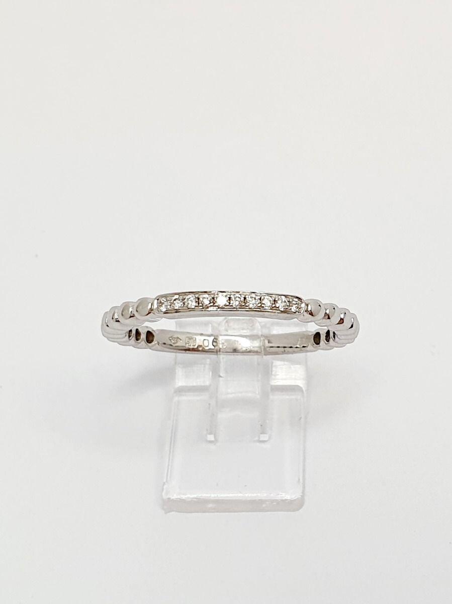 # 18K Weißgold Ehering mit 0,06 ct natürlichen Diamanten