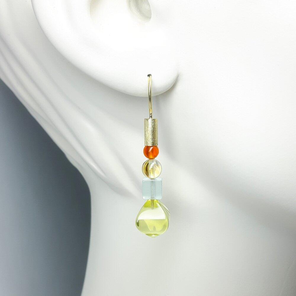 Earrings in 18kt yellow gold, lemon quartz pampels, fire opal, citrine and aquamarine. One of a kind.