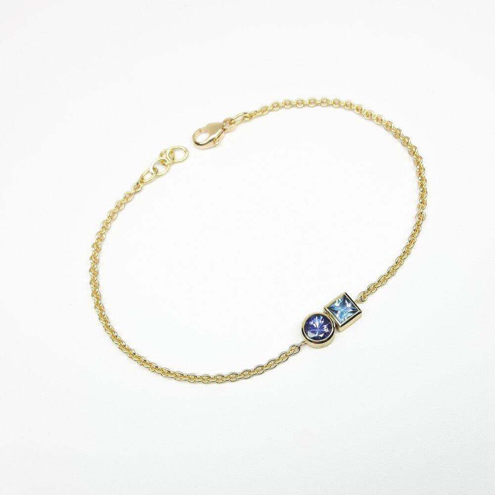 Delicate 18k yellow gold bracelet with Tanzanite and Aquamarine. One-of-a-kind.