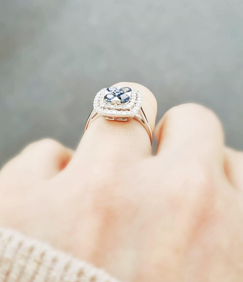 White gold ring with 0.76ct of Ceylon sapphires in a flower style and 0.38ct of natural diamonds