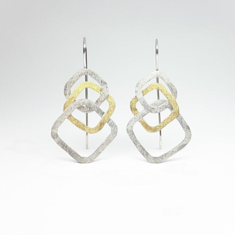 "dancing squares" Boucles d'oreilles en argent 925/- et or jaune 18kt. Pièce unique.