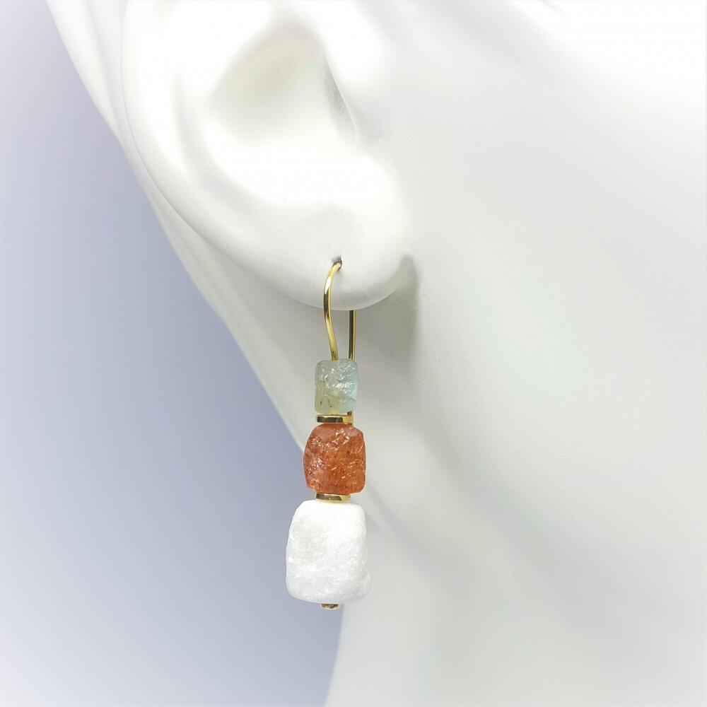 Earrings made of 18kt yellow gold, marble, sunstone as well as labradorite. Unique piece.