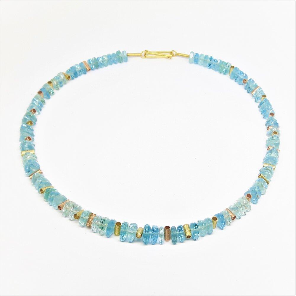 Gemstone necklace made of fine faceted aquamarine and 18kt yellow and rose gold. Unique piece.