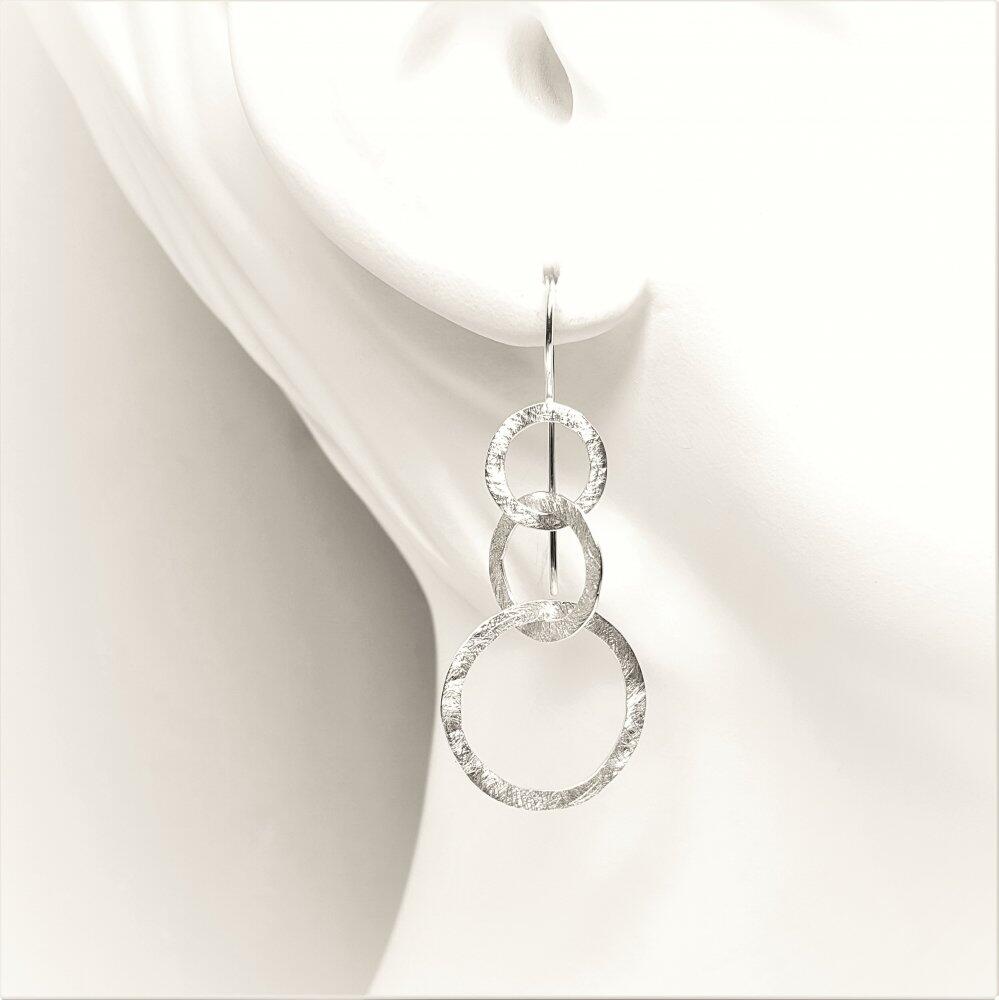 Boucles d'oreilles "dancing circles", argent 925/-.