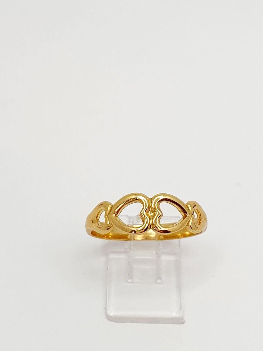 # Yellow gold ring with hearts