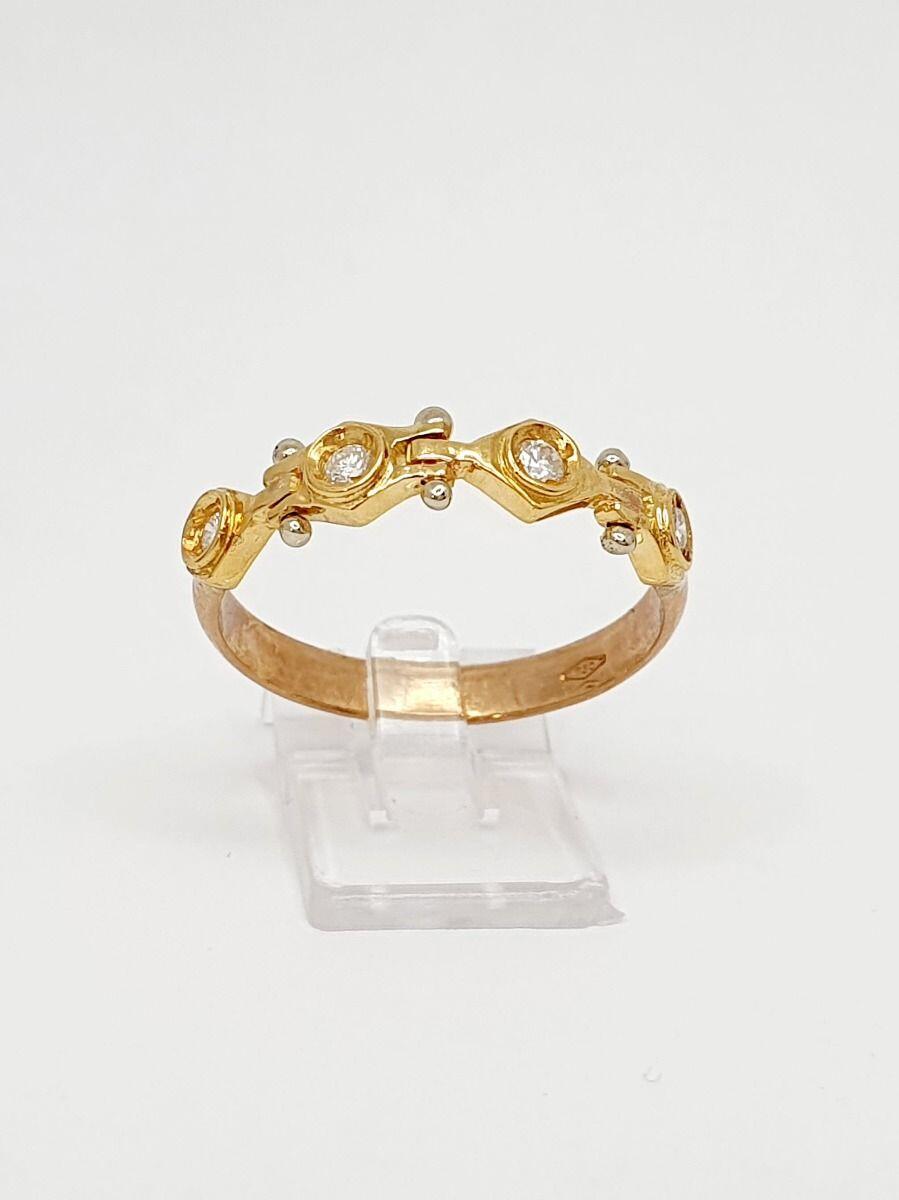 # Yellow gold ring with 0.12ct natural diamonds