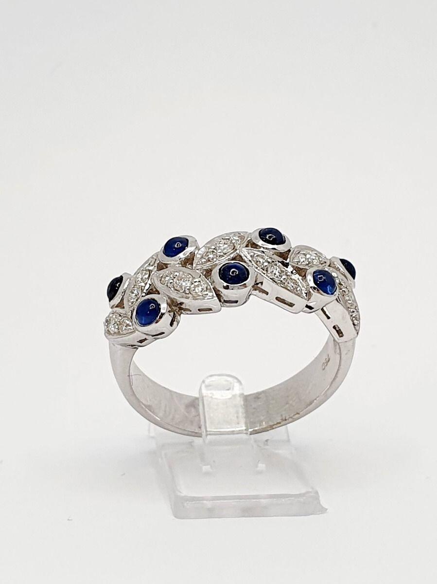 # White gold ring with 0.27ct sapphire and 0.69ct natural diamonds