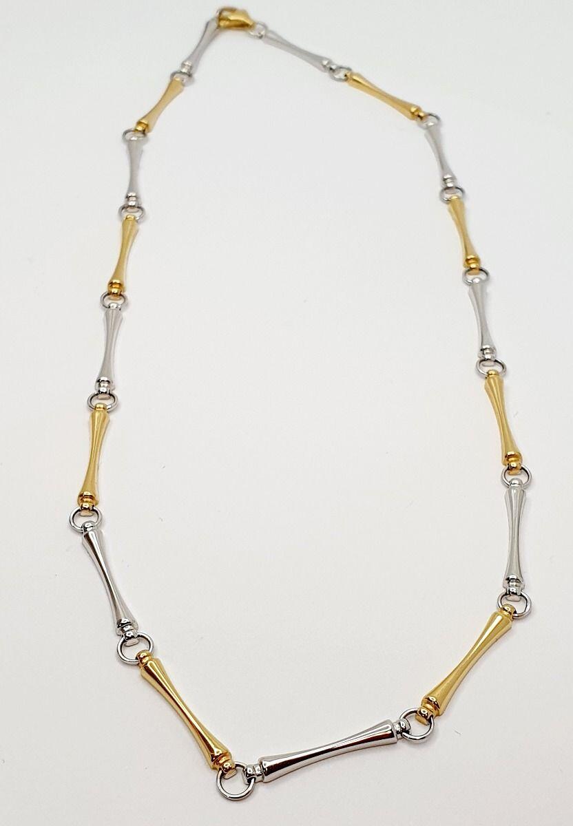 # Collier or jaune et or blanc squelettique et rondelles 44cm