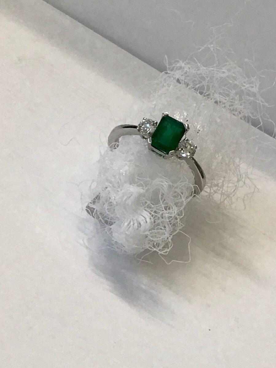 # 0.50ct emerald and 0.23ct diamonds white gold ring