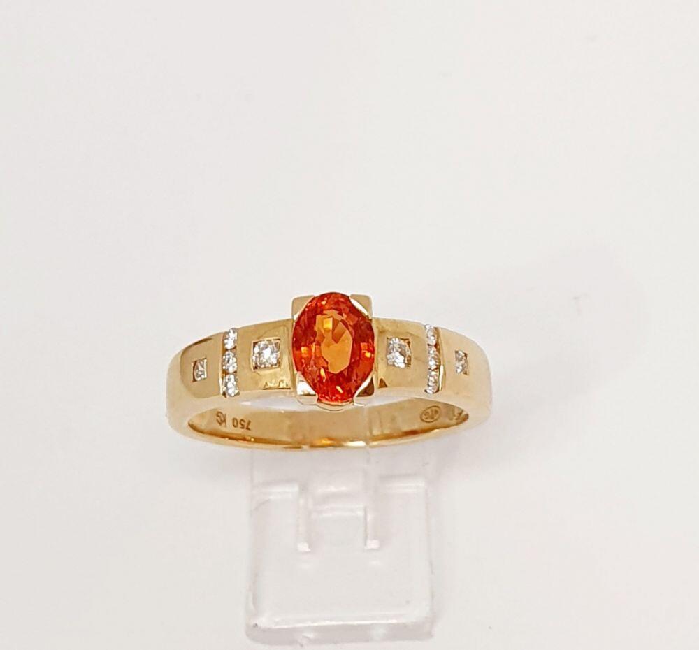 # Yellow gold ring with 0.94ct orange sapphire 0.16ct natural diamonds