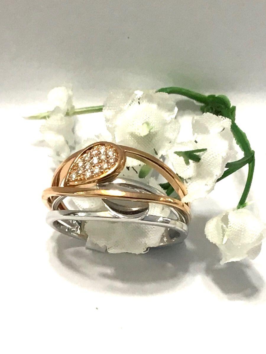 # Rose gold and white gold ring with zircon