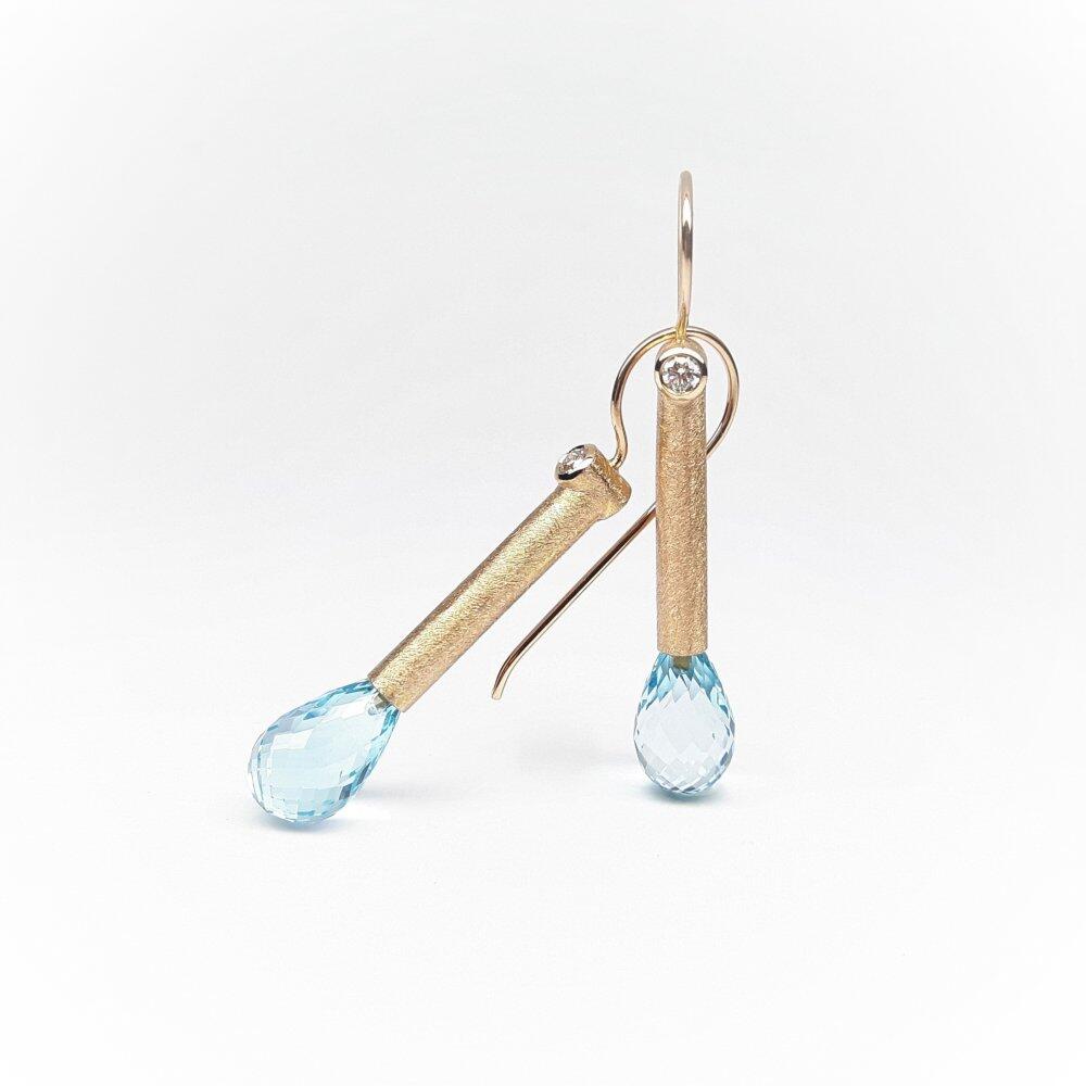 Earrings in 18kt rose gold, blue topaz and diamonds. Unique piece.