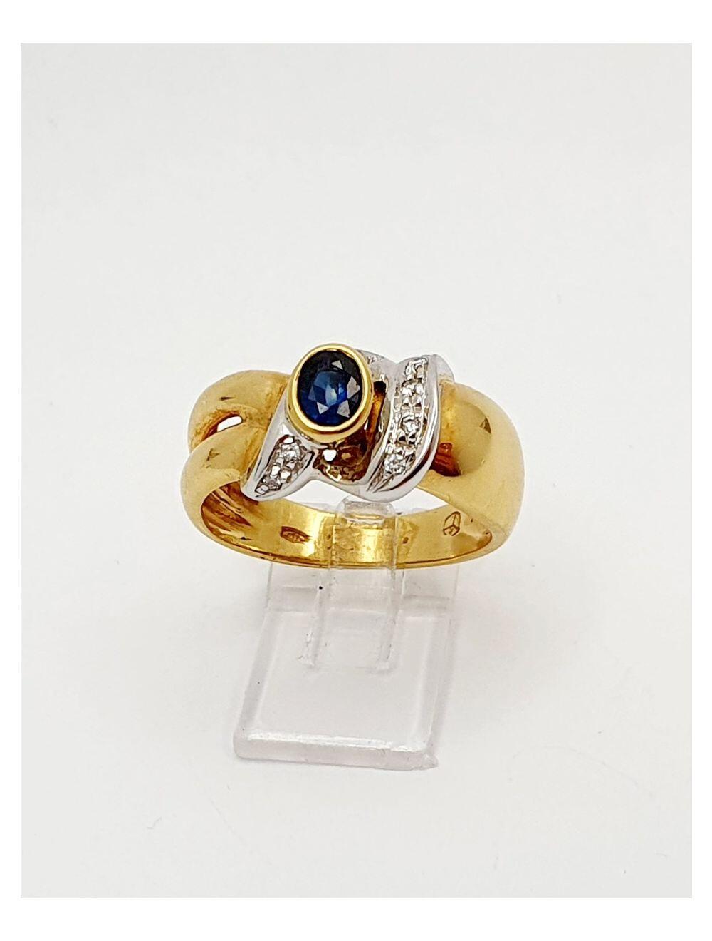 # Bague or jaune et or blanc avec 0.26ct saphire bleu et 0.05ct diamants naturels