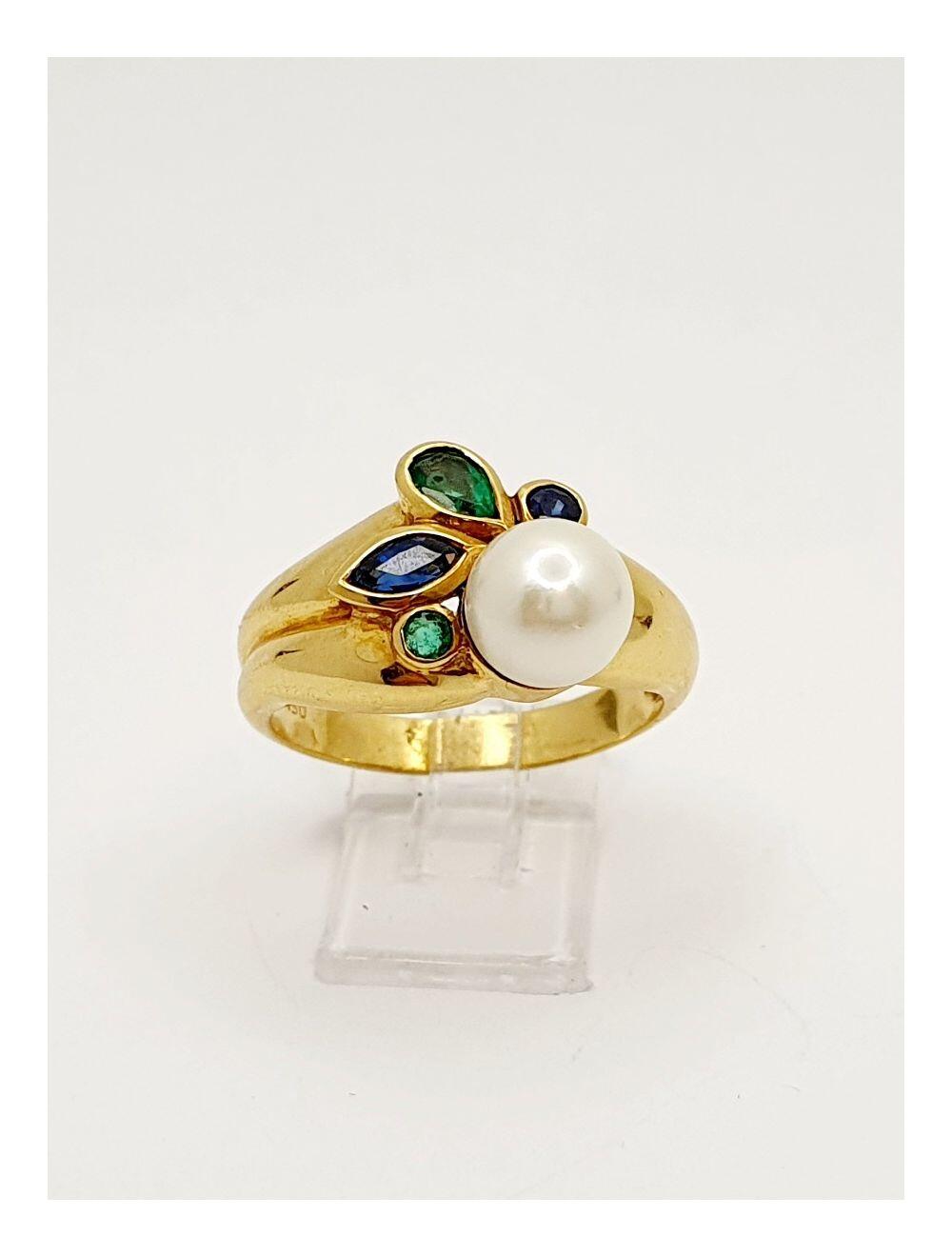 # Yellow gold ring with an Akoya pearl, sapphires and emeralds