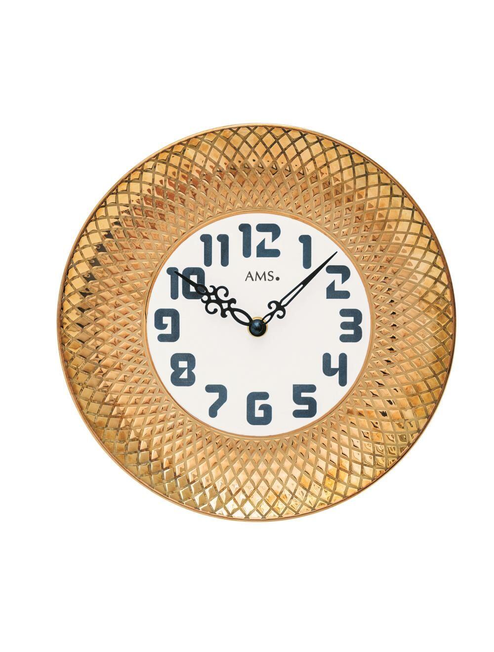 # Horloge murale AMS en Céramique doré taille environ 27x5 cm