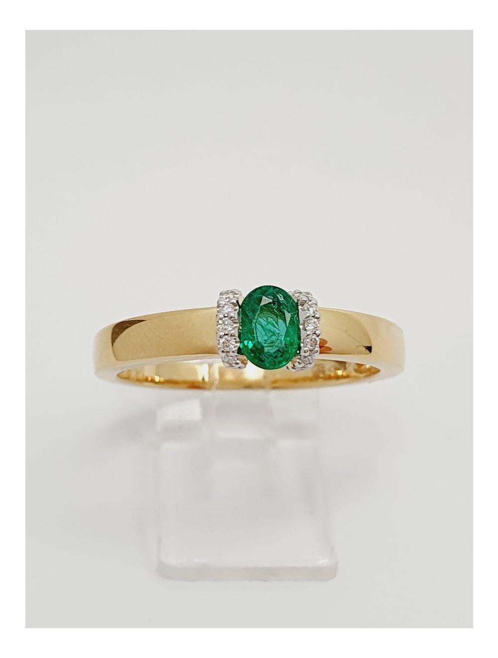 # Yellow gold ring with 0.29ct emerald and 0.06ct natural diamonds