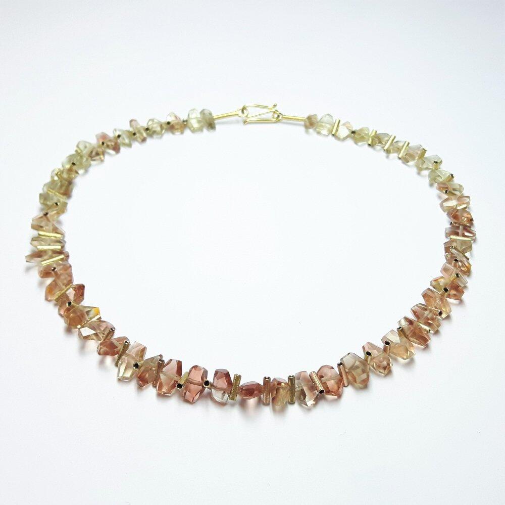 Gemstone necklace made of sunstone and 18kt yellow and rose gold elements.